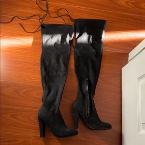 Thigh high black boots